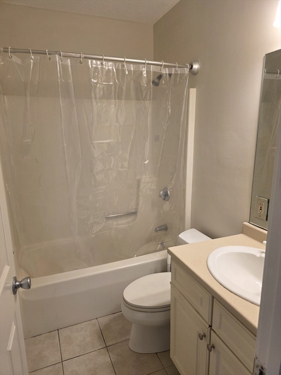 1201 Spring Valley Drive, Unit 1201 Andover, MA 01810 - Photo 14 of 18 a bathroom with a sink a toilet and shower