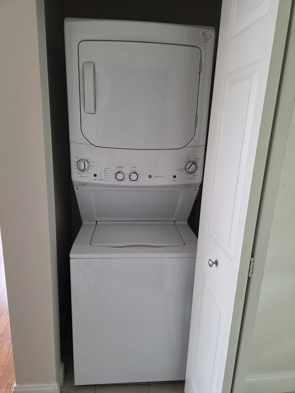1201 Spring Valley Drive, Unit 1201 Andover, MA 01810 - Photo 15 of 18 a utility room with dryer and washer