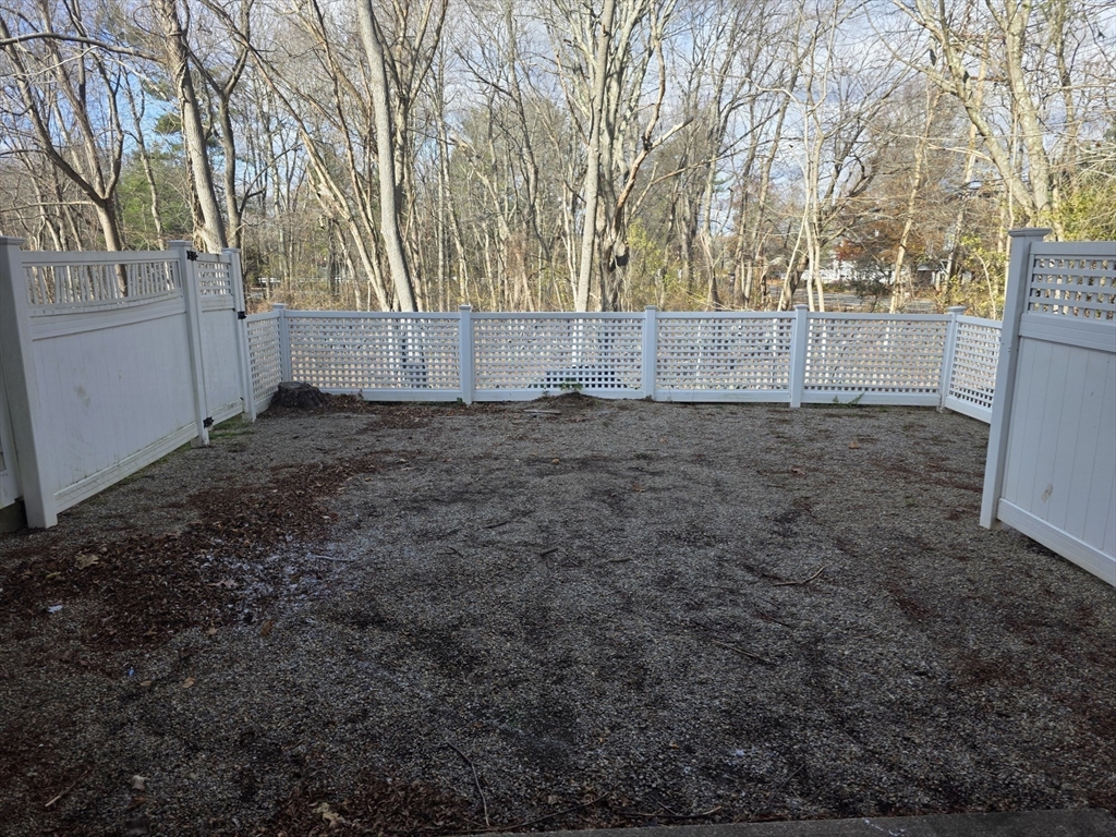 1201 Spring Valley Drive, Unit 1201 Andover, MA 01810 - Photo 17 of 18 a view of a backyard