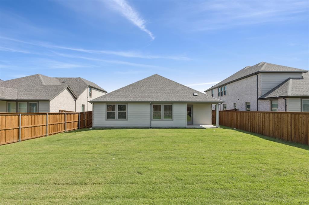 15213 Supreme Street Aledo, TX 76008 - Photo 27 of 32 a view of a house with a yard