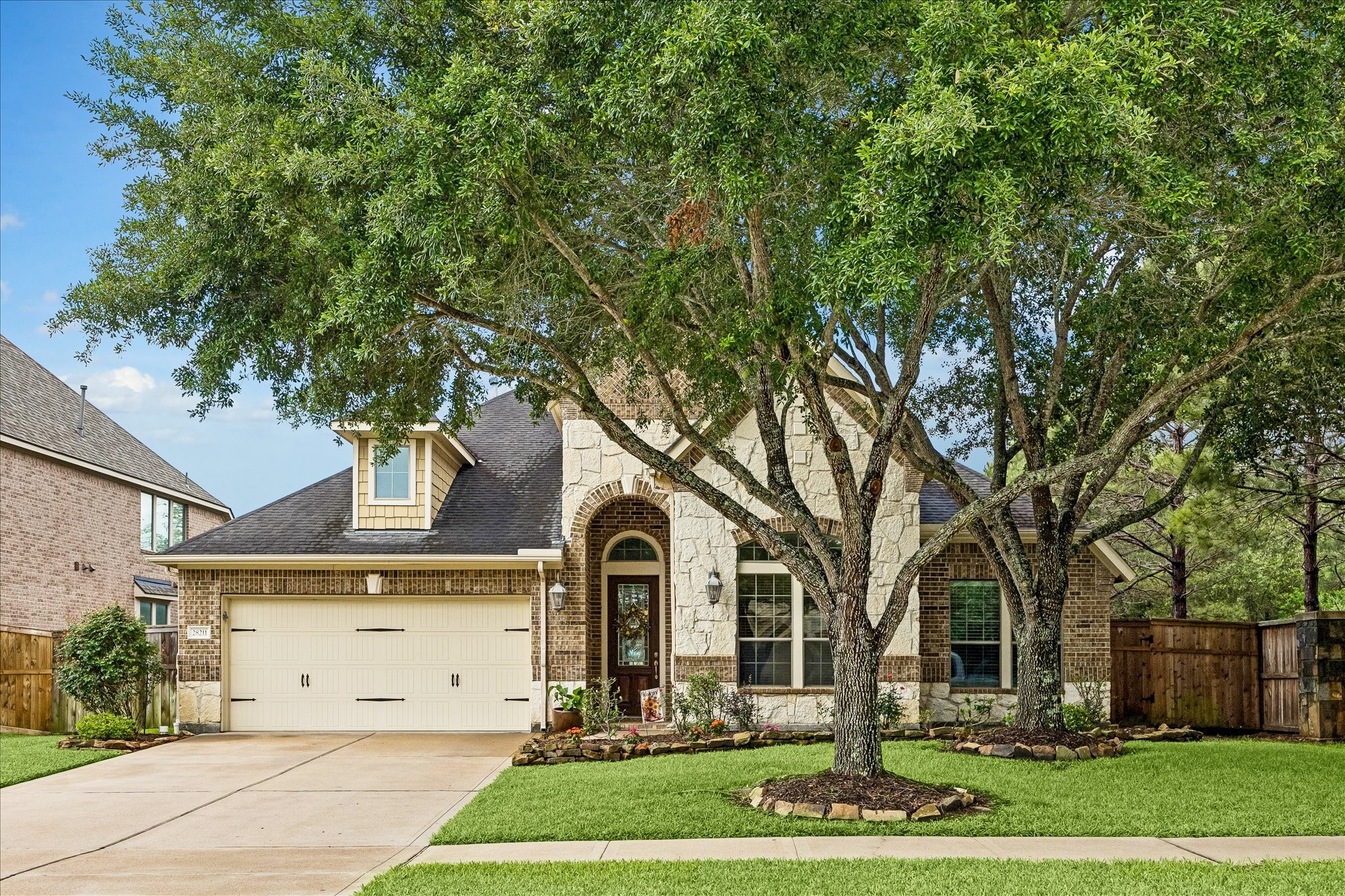 28211 Rippling Brook Lane Fulshear, TX 77441 - Photo 33 of 45 front view of a house with a yard