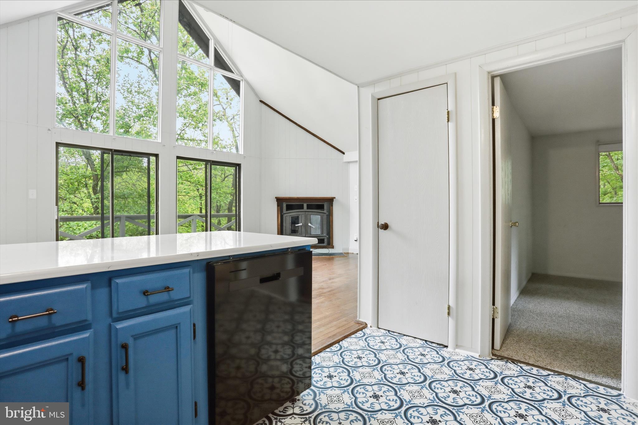 578 Walden Road Hedgesville, WV 25427 - Photo 12 of 39 a kitchen with a sink a refrigerator and window