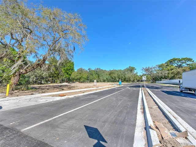 a view of a balcony and trees