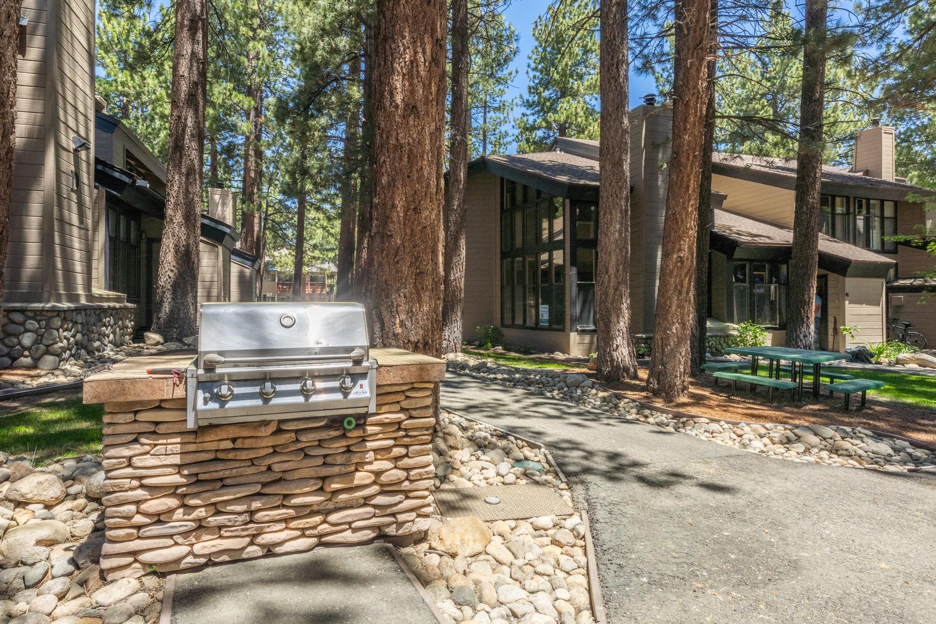 2252 Meridian Boulevard, Unit 5 Mammoth Lakes, CA 93546 - Photo 24 of 33 a view of a house with a yard and sitting area