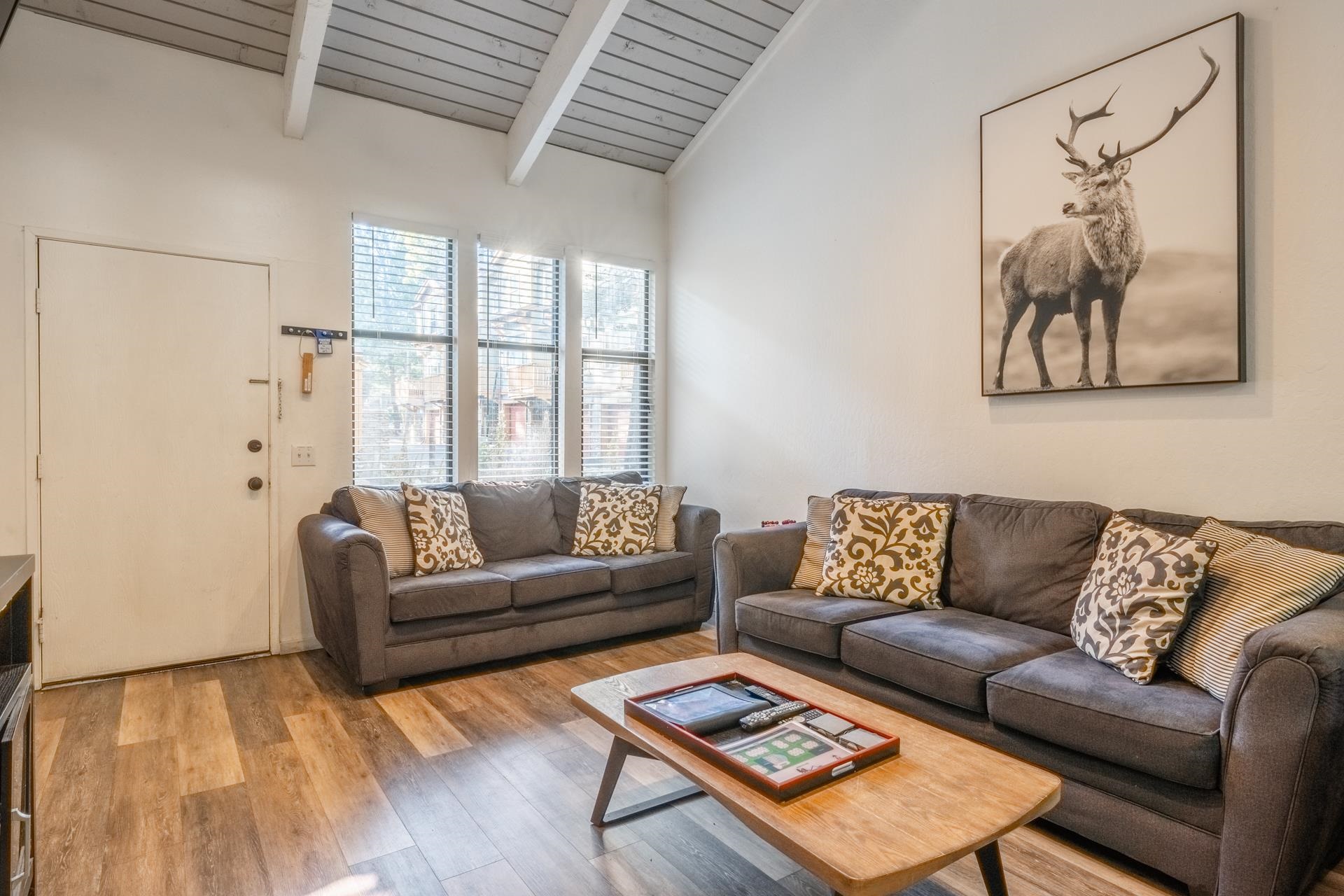 2252 Meridian Boulevard, Unit 5 Mammoth Lakes, CA 93546 - Photo 6 of 33 a living room with furniture and a large window