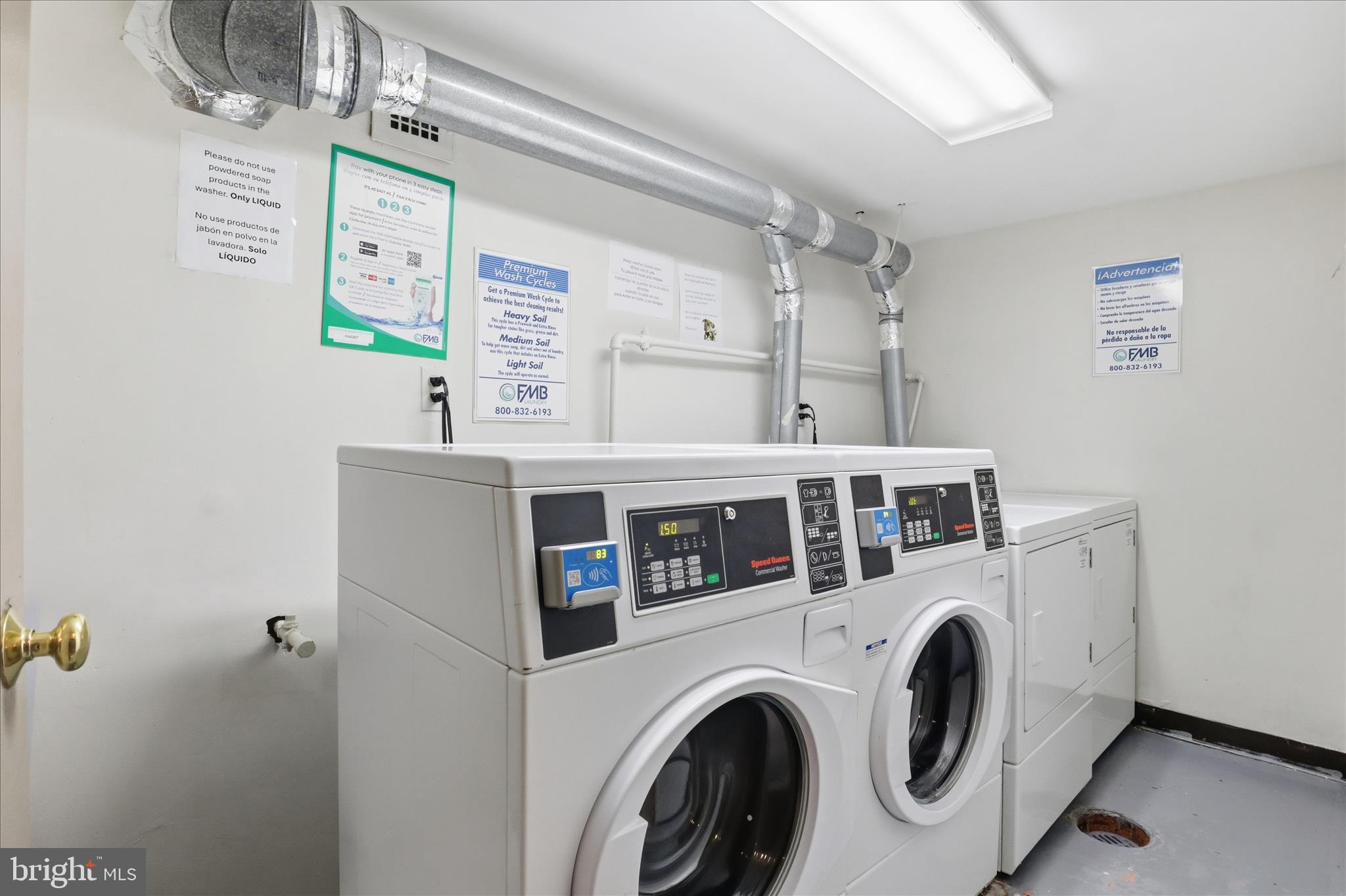 4600 South Four Mile Run Drive, Unit 207 Arlington, VA 22204 - Photo 18 of 53 a utility room with dryer and washer