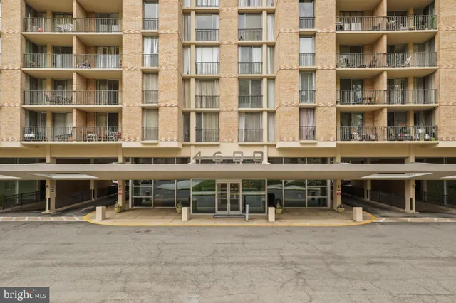 a front view of a building with a lot of windows