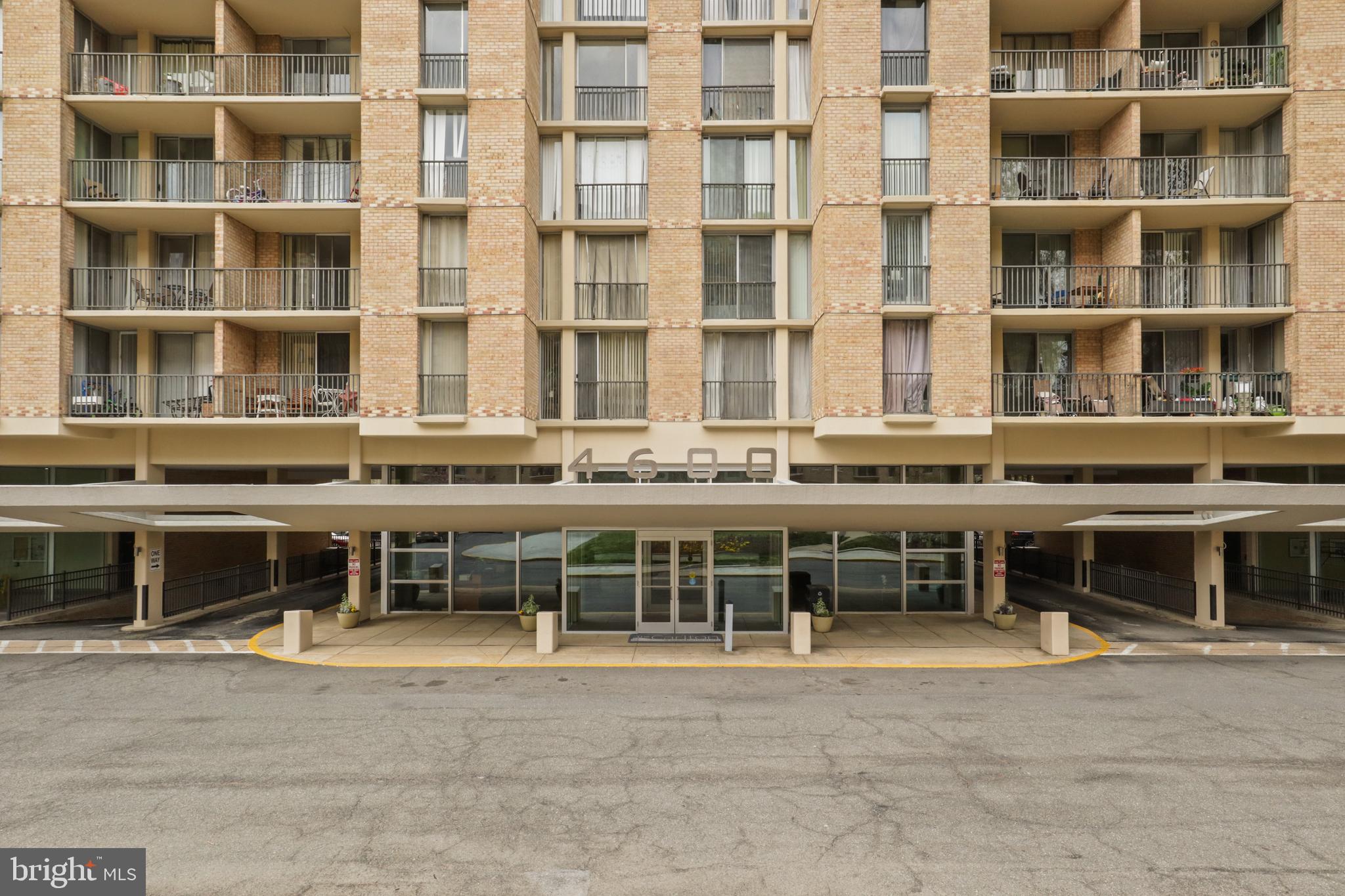 4600 South Four Mile Run Drive, Unit 207 Arlington, VA 22204 - Photo 19 of 53 a front view of a building with a lot of windows