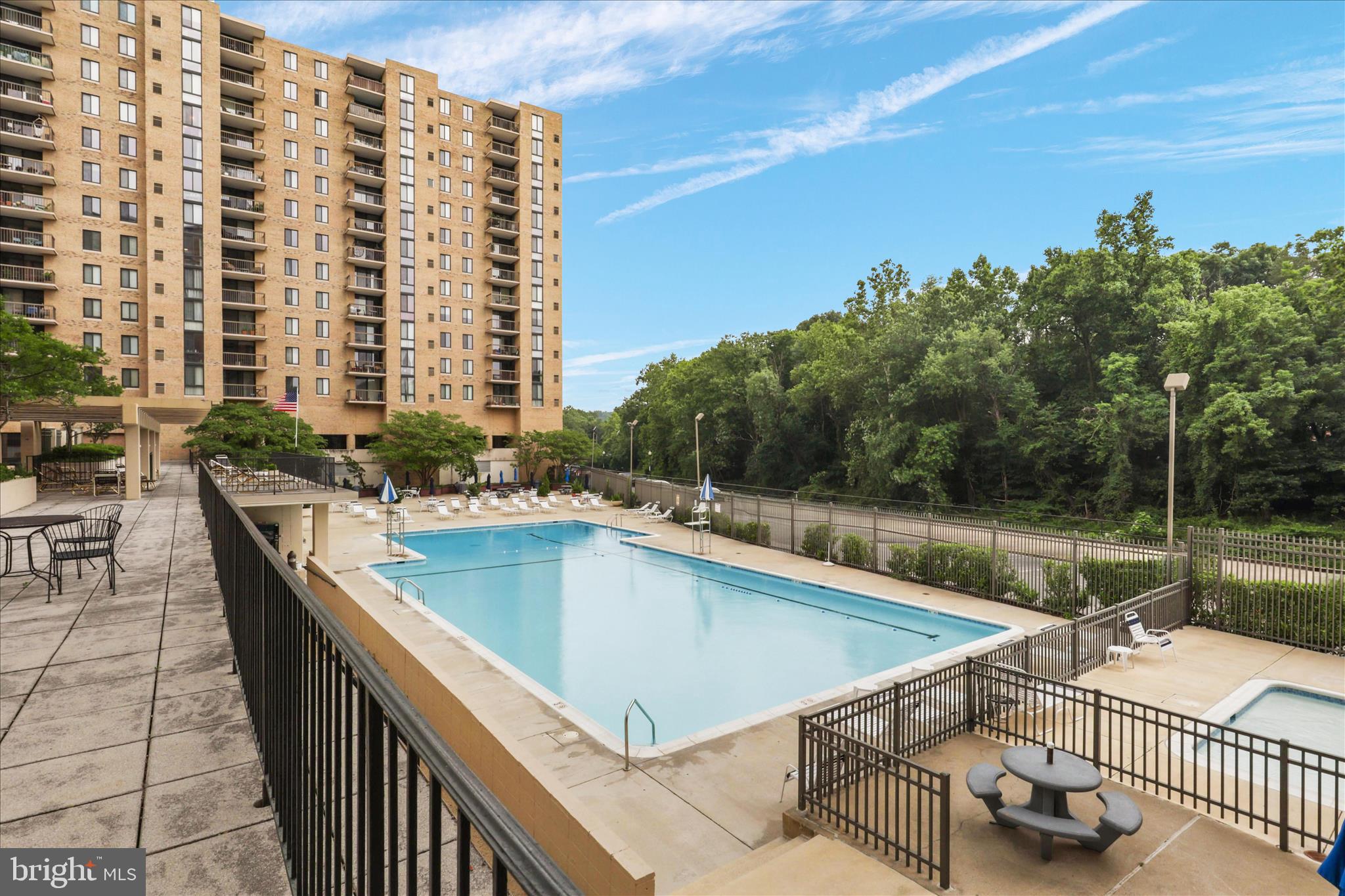 4600 South Four Mile Run Drive, Unit 207 Arlington, VA 22204 - Photo 24 of 53 a terrace with outdoor seating and city view