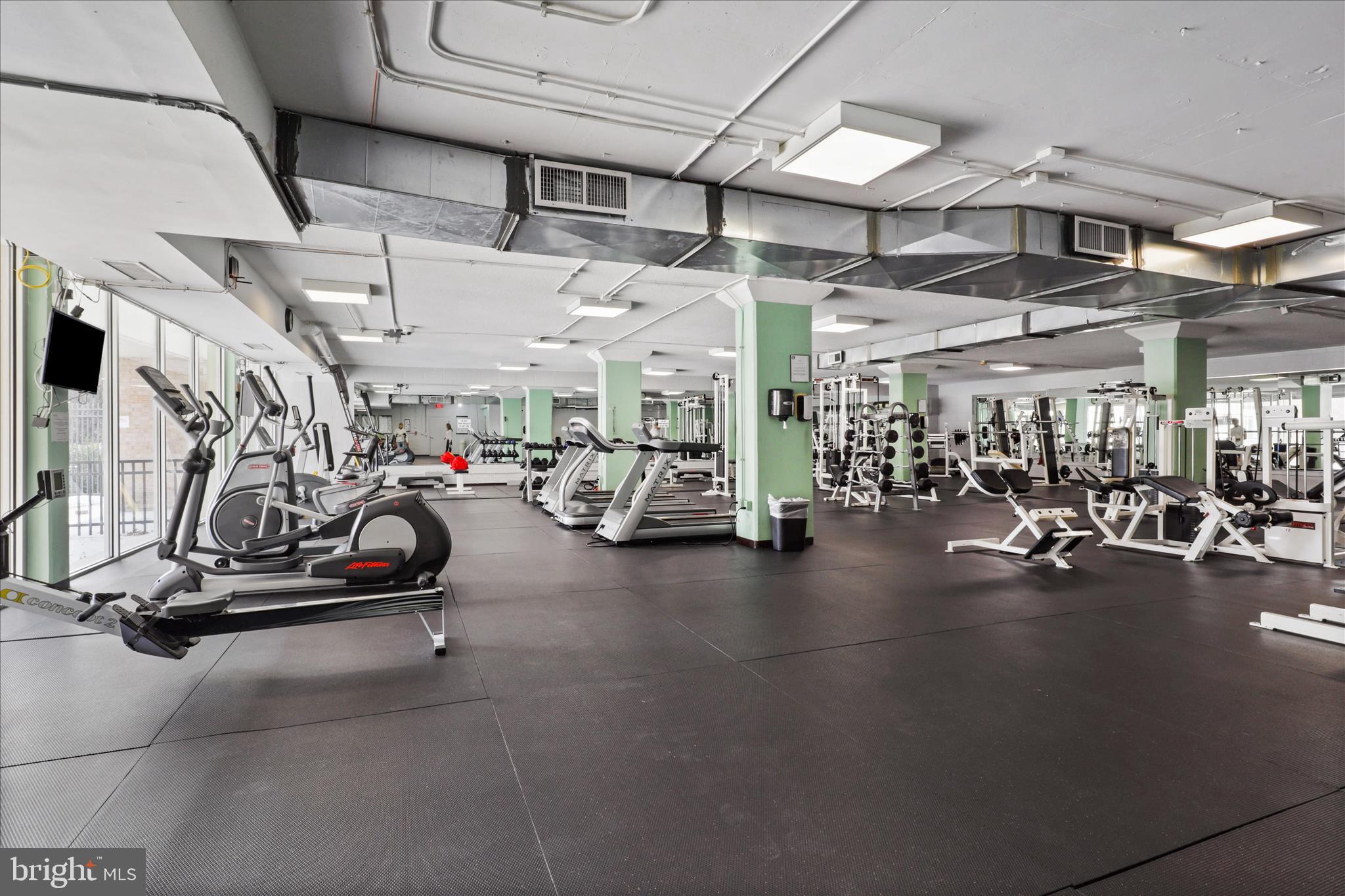 4600 South Four Mile Run Drive, Unit 207 Arlington, VA 22204 - Photo 27 of 53 a view of a room with gym equipment