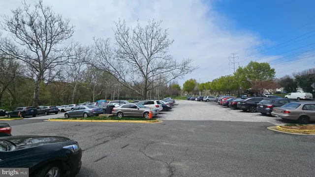 a view of street with parked cars