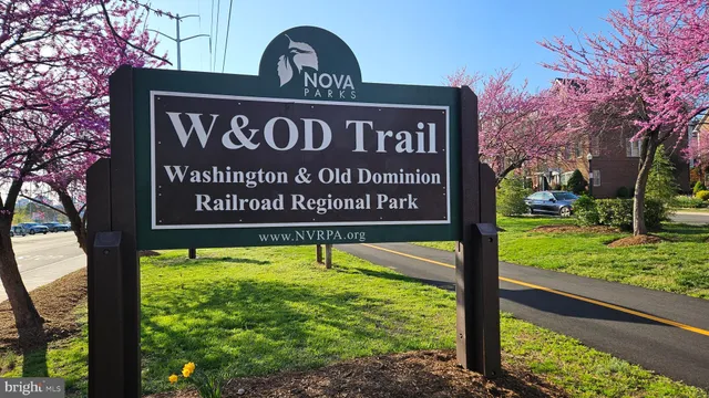 a front view of a building with sign board