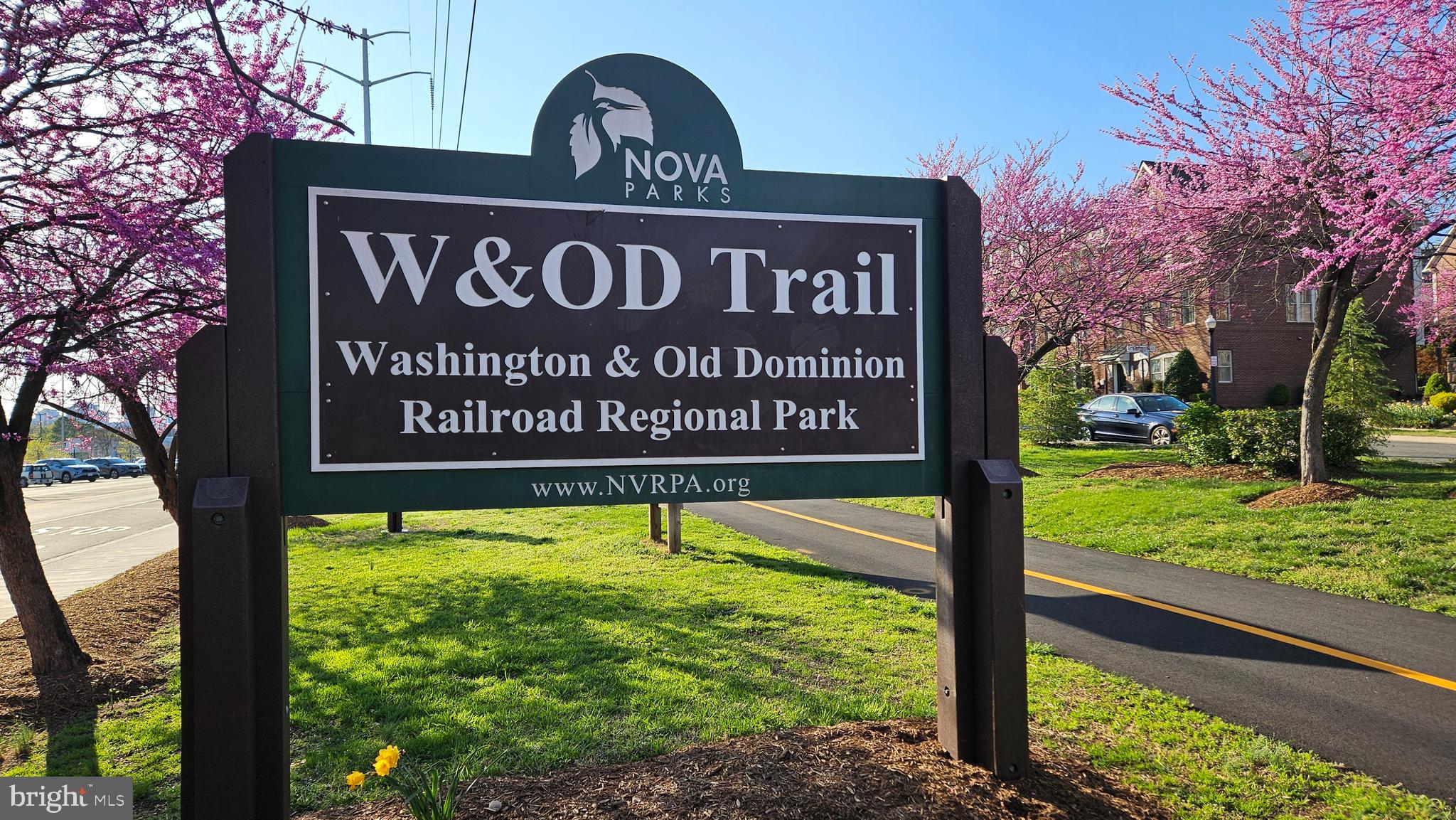 4600 South Four Mile Run Drive, Unit 207 Arlington, VA 22204 - Photo 39 of 53 a sign broad on the side of the road