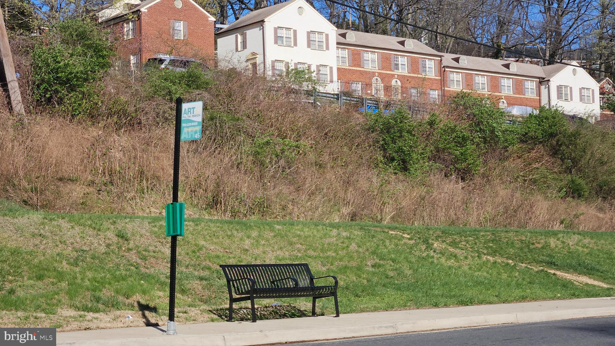 4600 South Four Mile Run Drive, Unit 207 Arlington, VA 22204 - Photo 40 of 53 a front view of a house with a yard