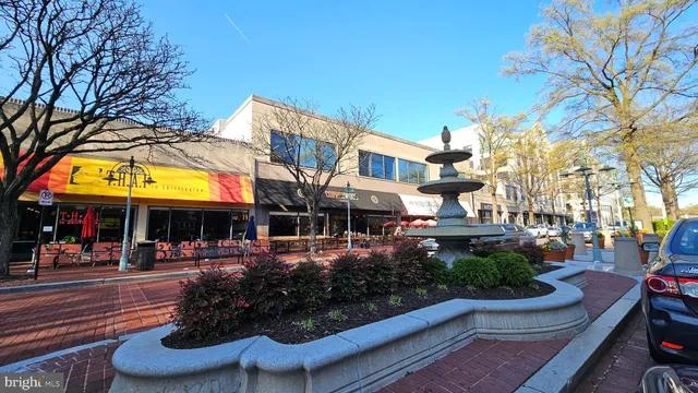 a picture of a park with a bench