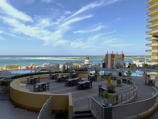 a view of a lobby with furniture and chandelier
