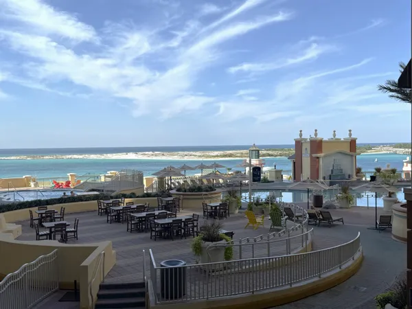 a view of a swimming pool with an ocean view