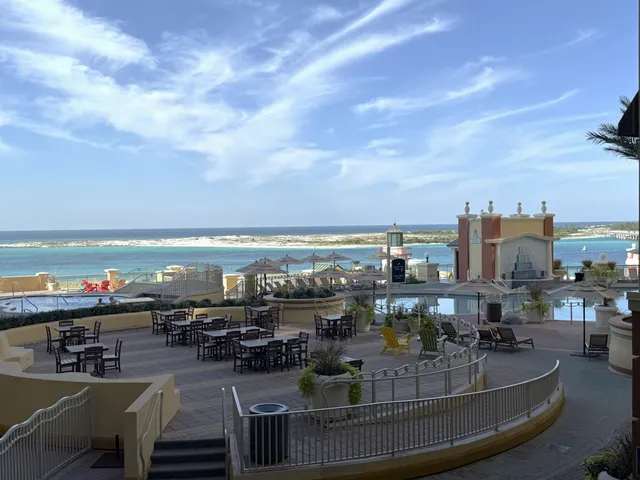 a view of a swimming pool with an ocean view
