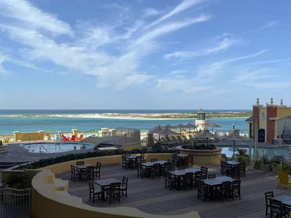 a view of a chairs and table on the terrace