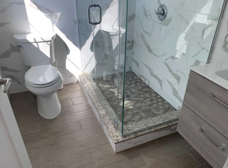 107 Mountain Road Jersey City, NJ 07307 - Photo 12 of 41 a bathroom with a sink and toilet