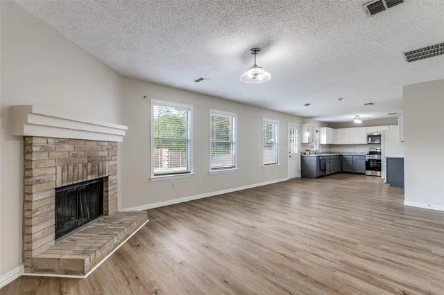 a view of livingroom and a fireplace