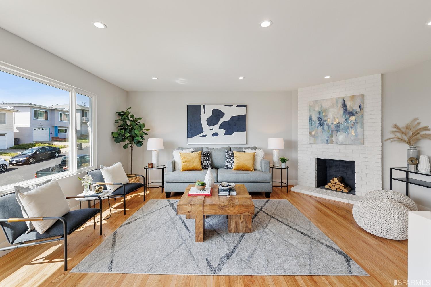 151 Longview Drive Daly City, CA 94015 - Photo 3 of 11 a living room with furniture and a fireplace