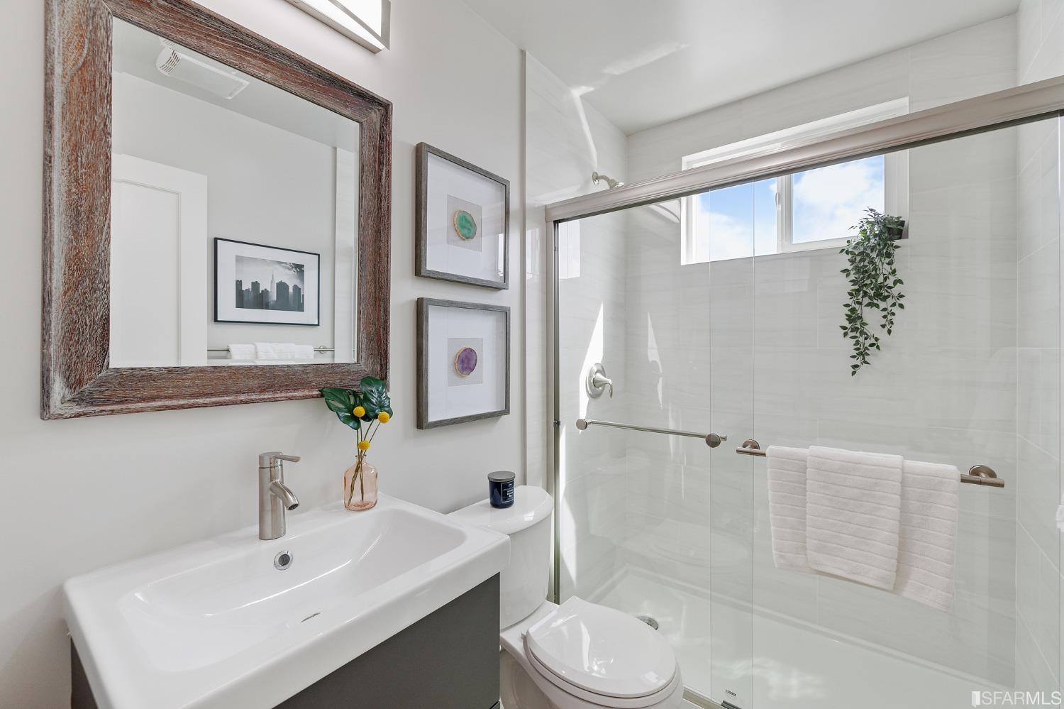 151 Longview Drive Daly City, CA 94015 - Photo 5 of 11 a bathroom with a sink mirror toilet and shower