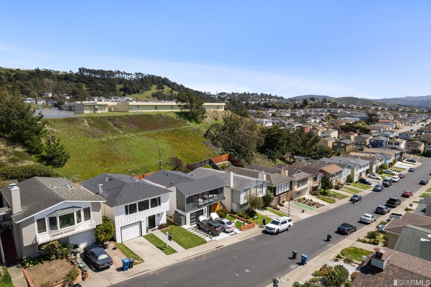 151 Longview Drive Daly City, CA 94015 - Photo 8 of 11 an aerial view of a house with a lake view