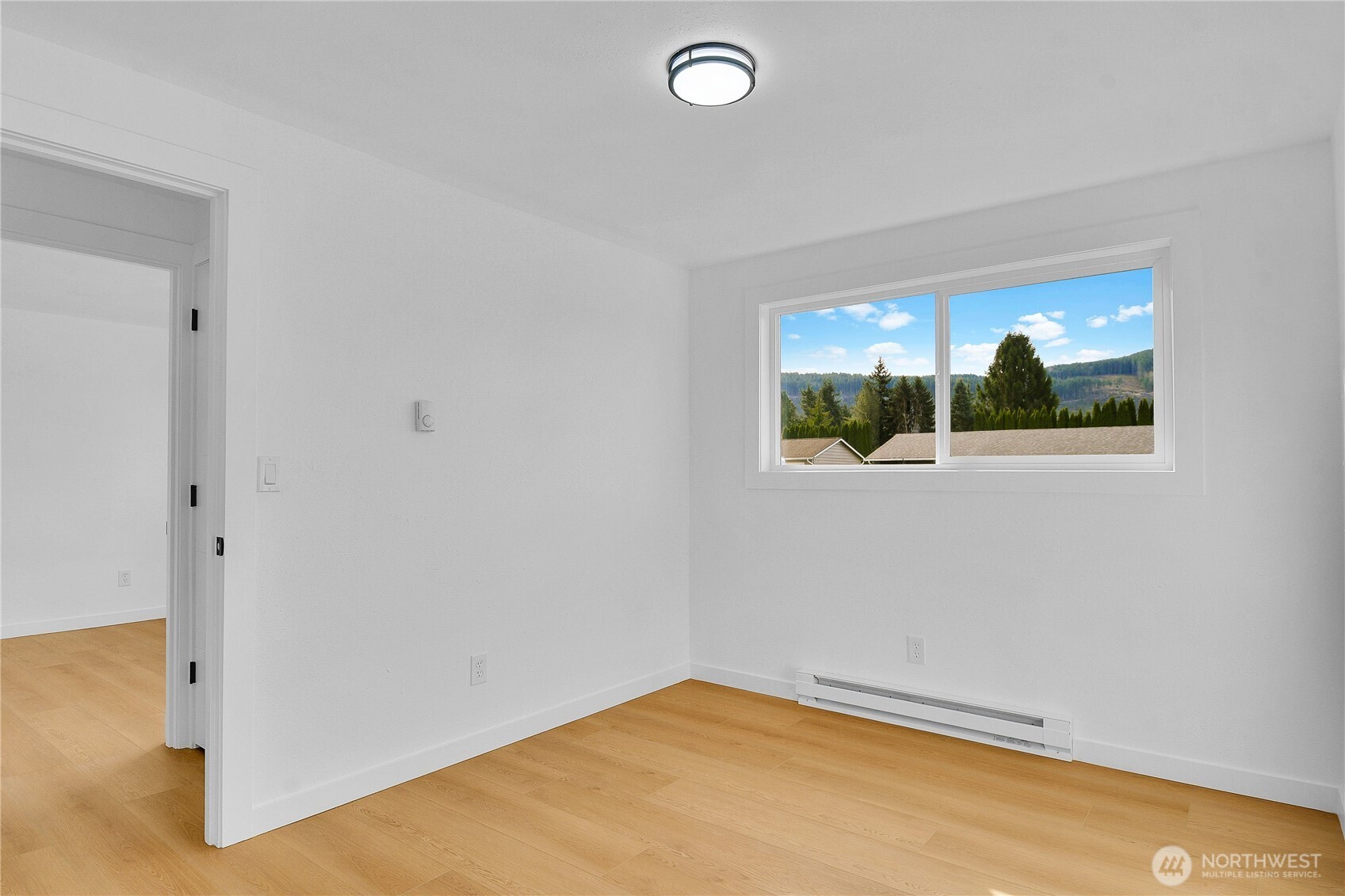 1006 Fidalgo Street Sedro-Woolley, WA 98284 - Photo 13 of 20 an empty room with windows