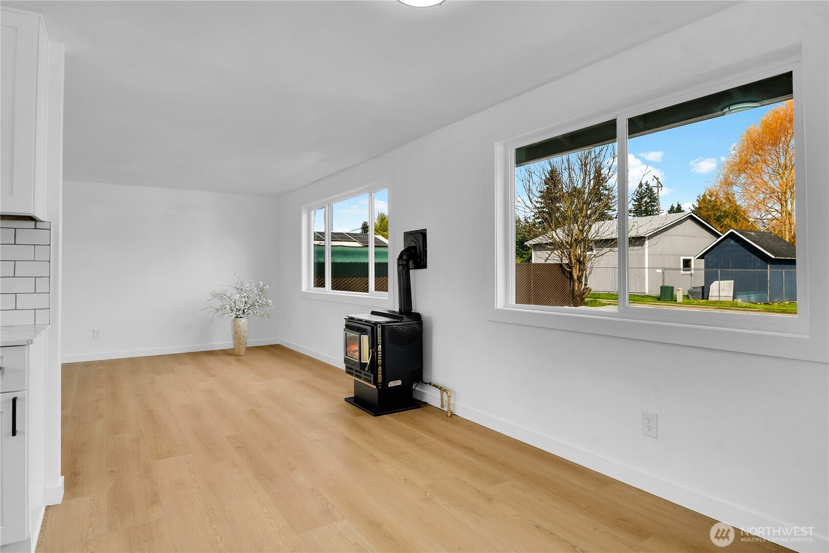 1006 Fidalgo Street Sedro-Woolley, WA 98284 - Photo 5 of 20 a view of a bedroom with a window