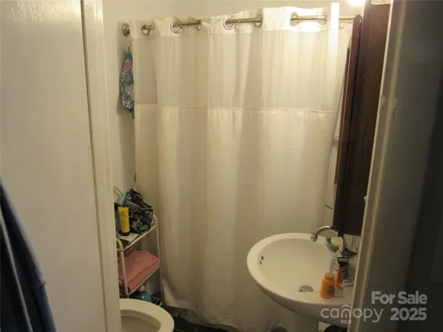 a front view of a house with wooden floor