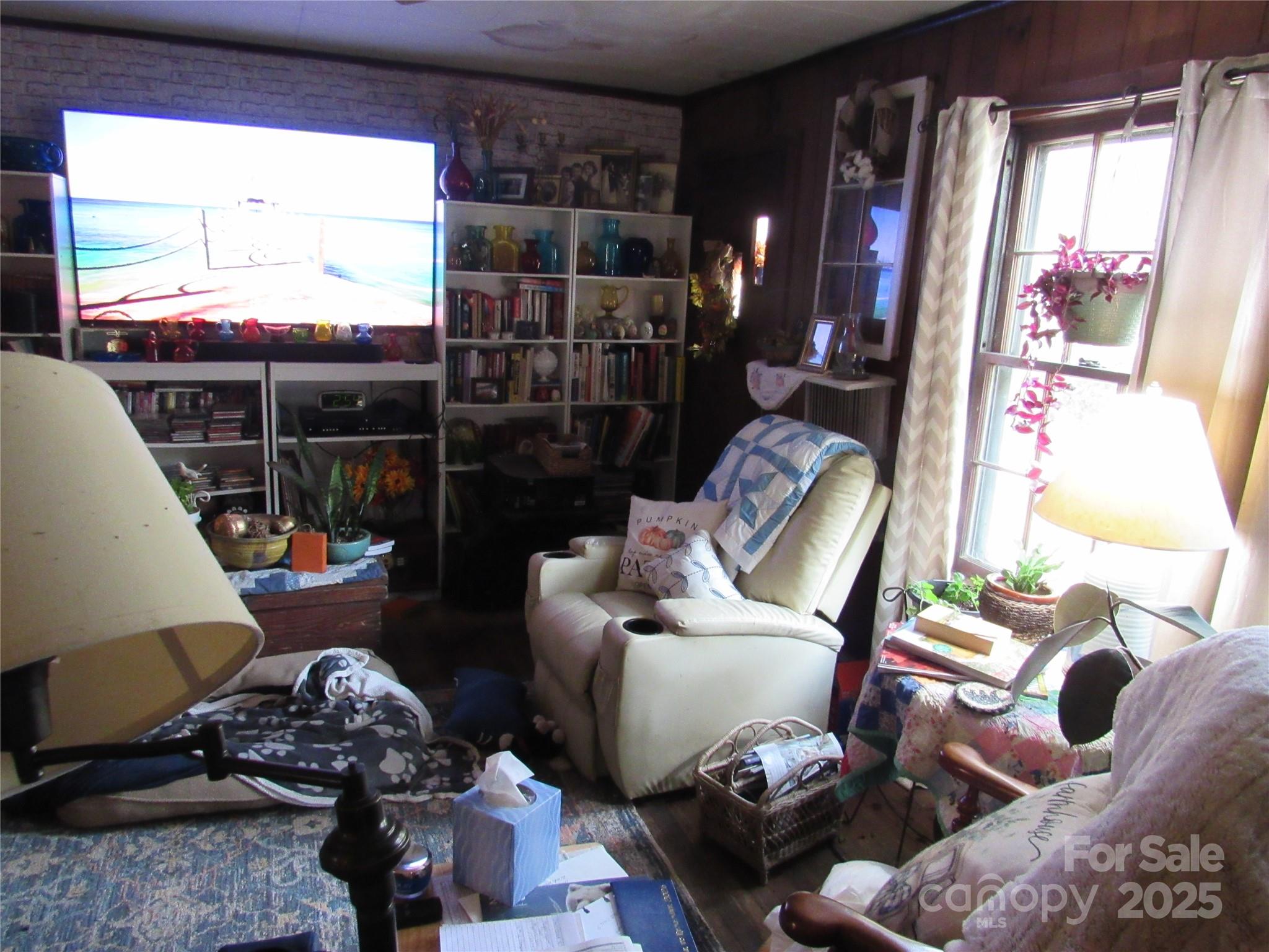 1144 Montreat Road Black Mountain, NC 28711 - Photo 29 of 30 a living room with furniture and a window