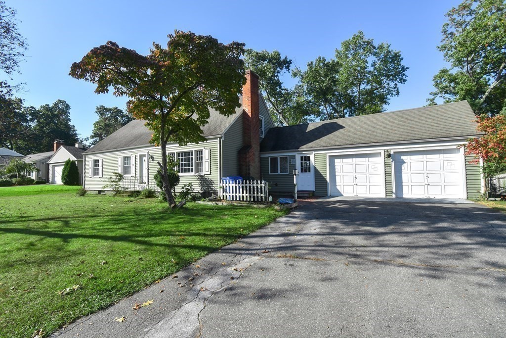 70 Intervale Road Springfield, MA 01118 - Photo 1 of 39 a front view of a house with a garden