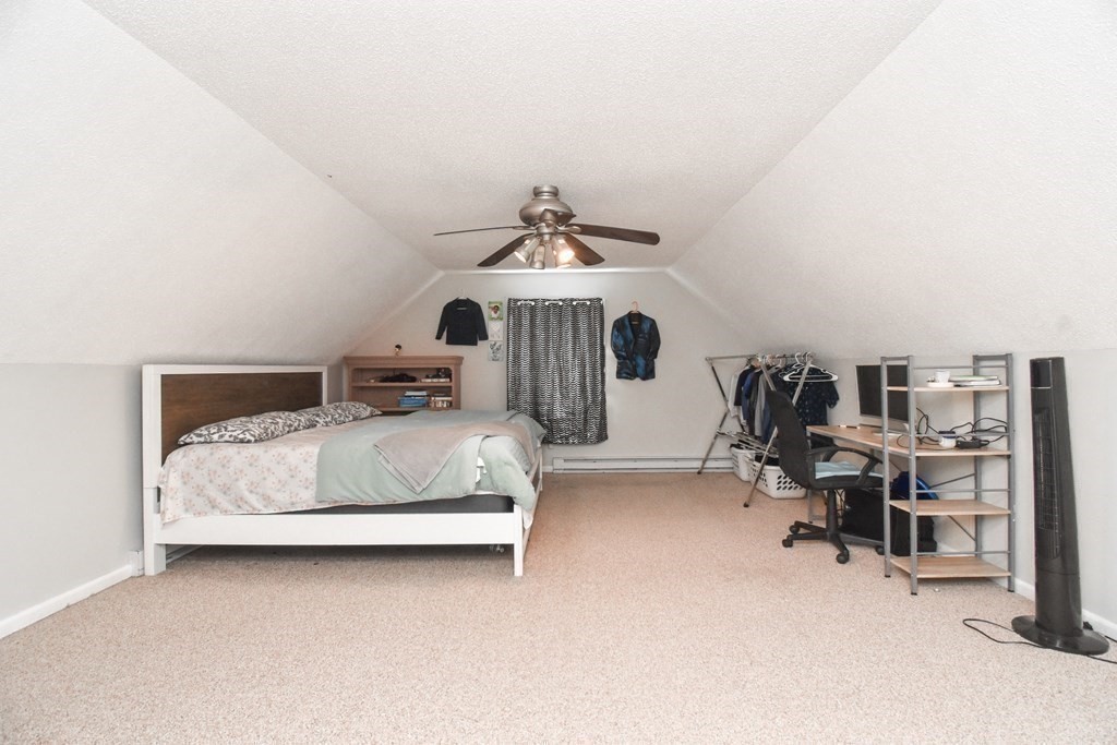 70 Intervale Road Springfield, MA 01118 - Photo 22 of 39 a bedroom with furniture and white walls