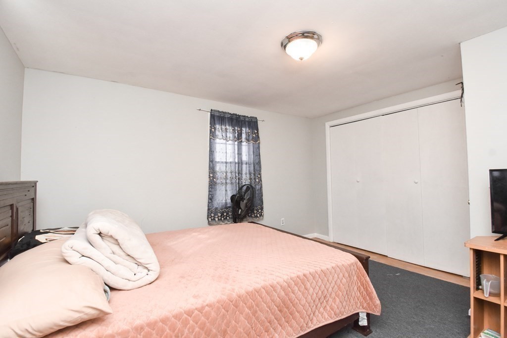 70 Intervale Road Springfield, MA 01118 - Photo 29 of 39 a bedroom with a bed and a window