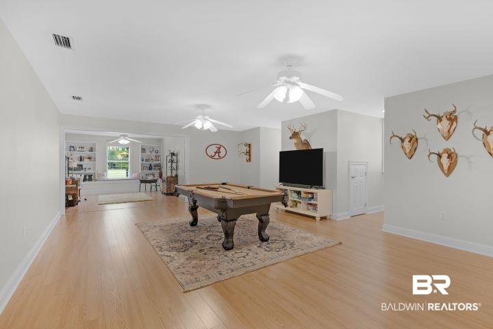 24541 Baldwin Beach Expressway Robertsdale, AL 36567 - Photo 24 of 51 Playroom featuring baseboards, ceiling fan, light wood-style flooring, visible vents, and pool table