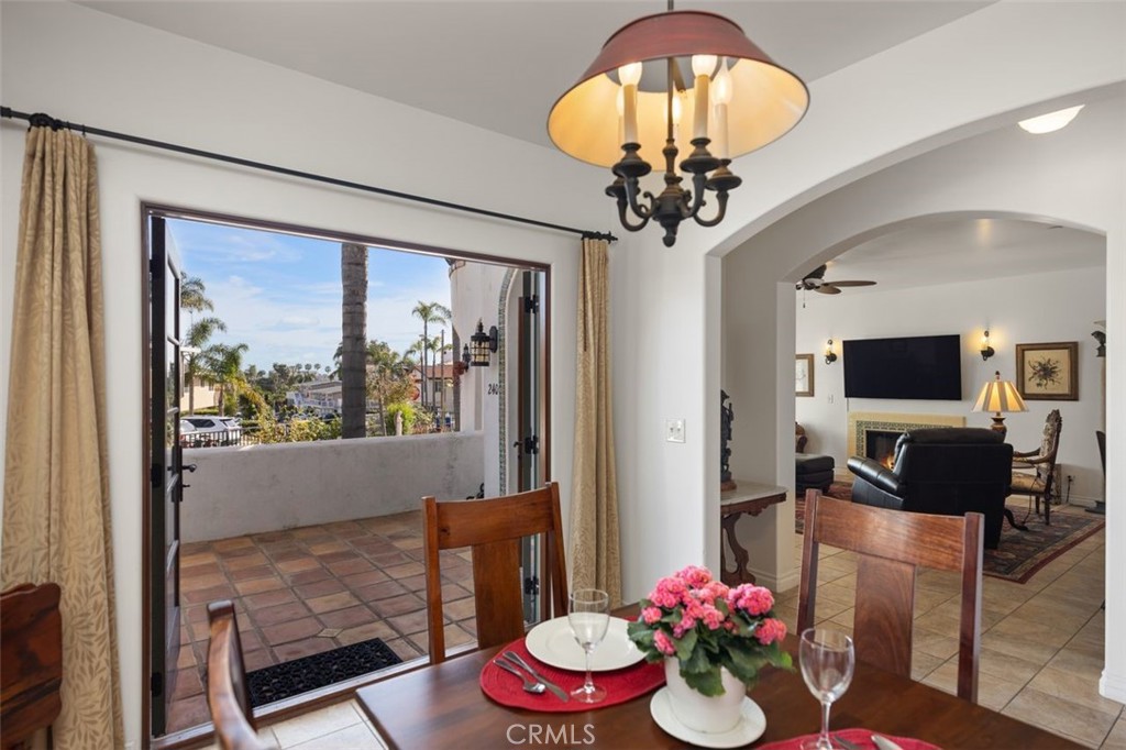 240 Avenida Rosa, Unit B San Clemente, CA 92672 - Photo 13 of 31 Dining area with doors that can open to patio/BBQ area.