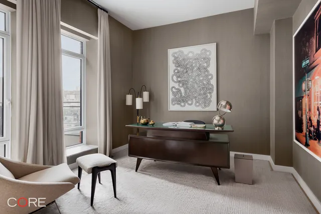 a living room with a couch and a window