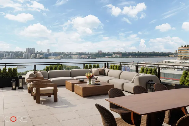 a terrace view with seating space barbeque oven and city view