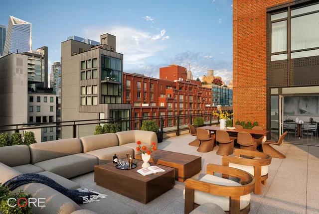 a balcony with furniture and view of city view