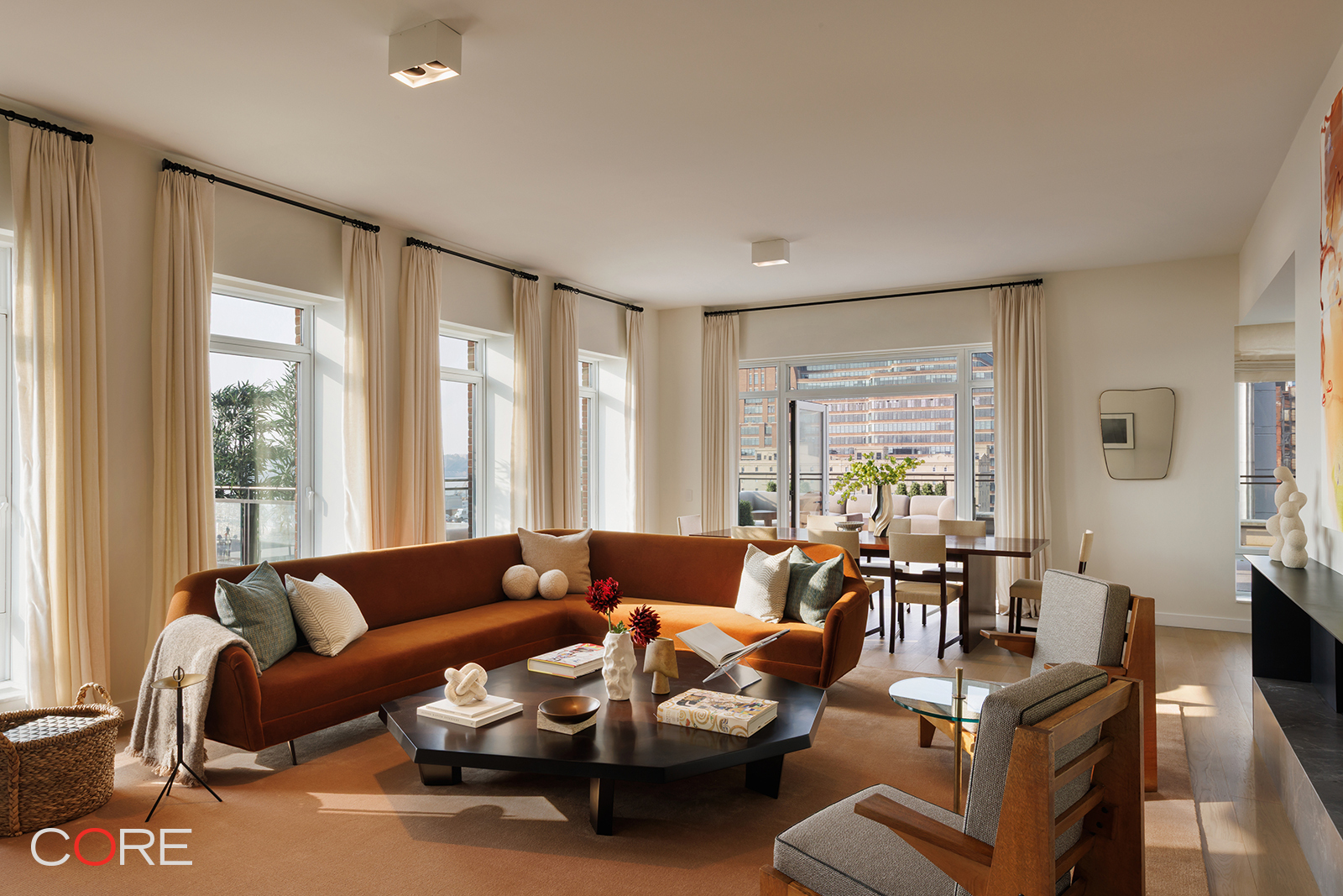 555 West 22nd Street, Unit 11AW Manhattan, NY 10011 - Photo 2 of 15 a living room with furniture and large windows
