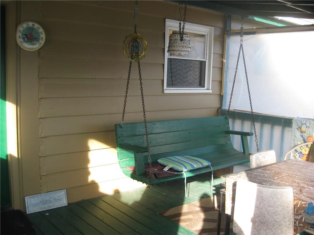 962 Leesburg Station Road Volant, PA 16156 - Photo 14 of 16 Covered back porch