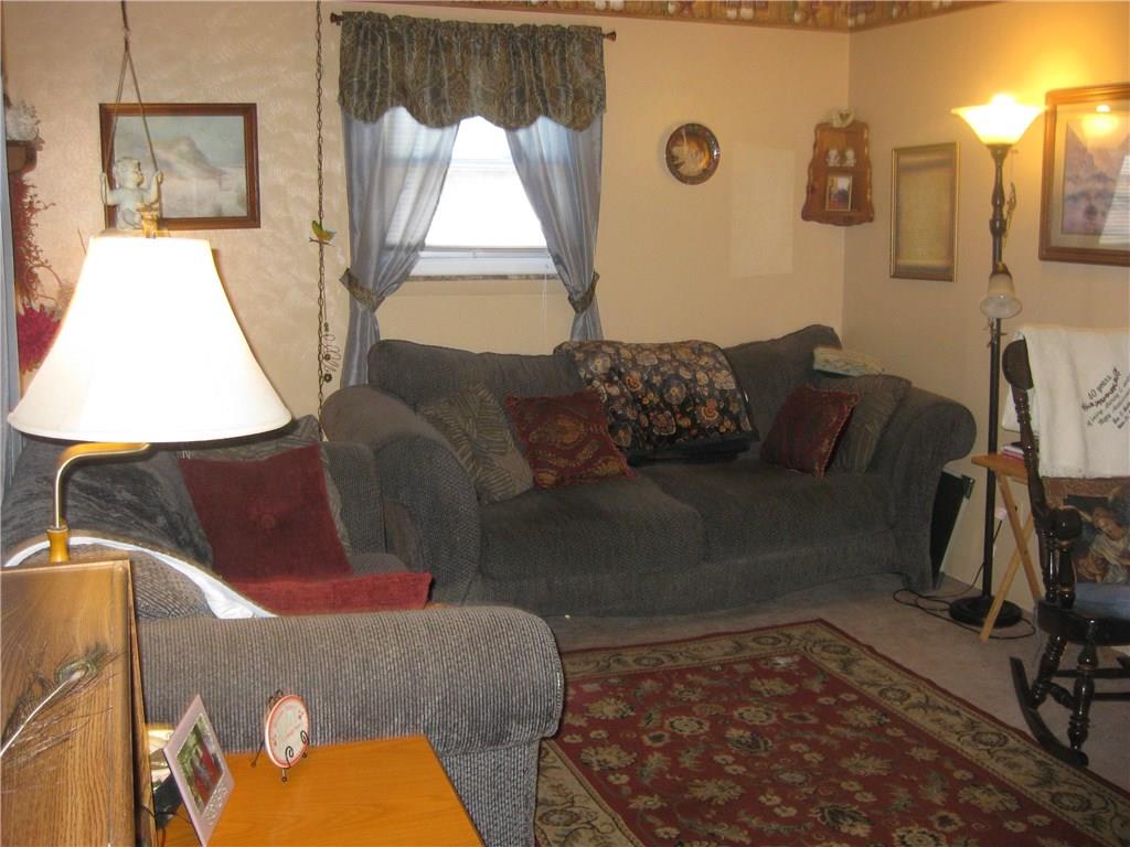 962 Leesburg Station Road Volant, PA 16156 - Photo 9 of 16 Comfy, cozy living room