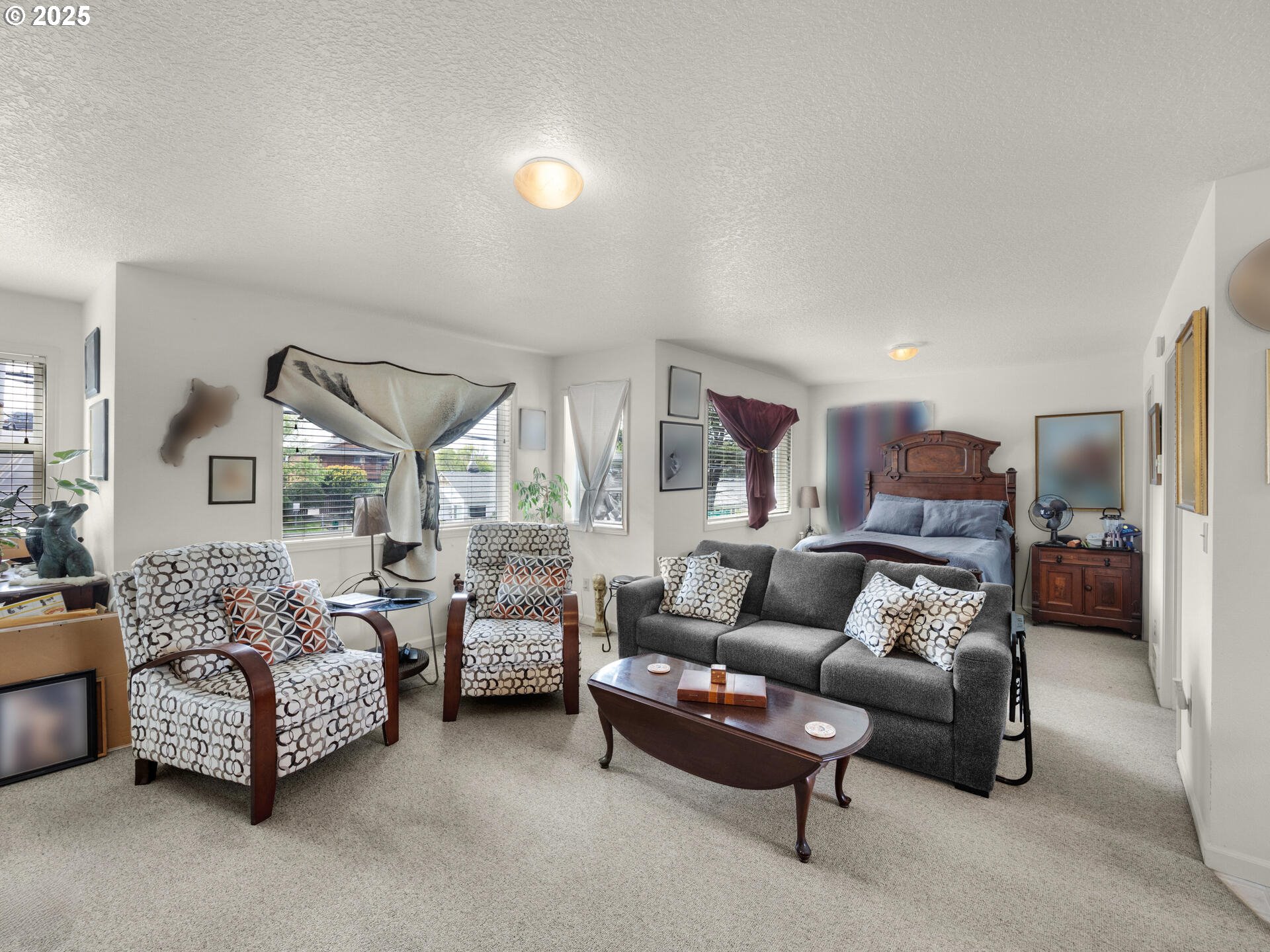 107 Sunset Boulevard Cannon Beach, OR 97110 - Photo 17 of 25 a living room with furniture and a large window
