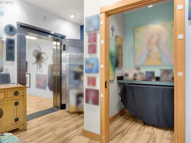 a bathroom with a glass shower door and a mirror