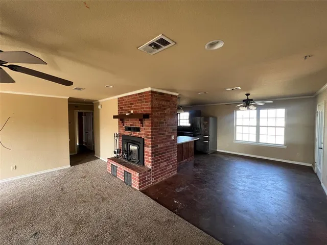 a view of a livingroom with a fireplace