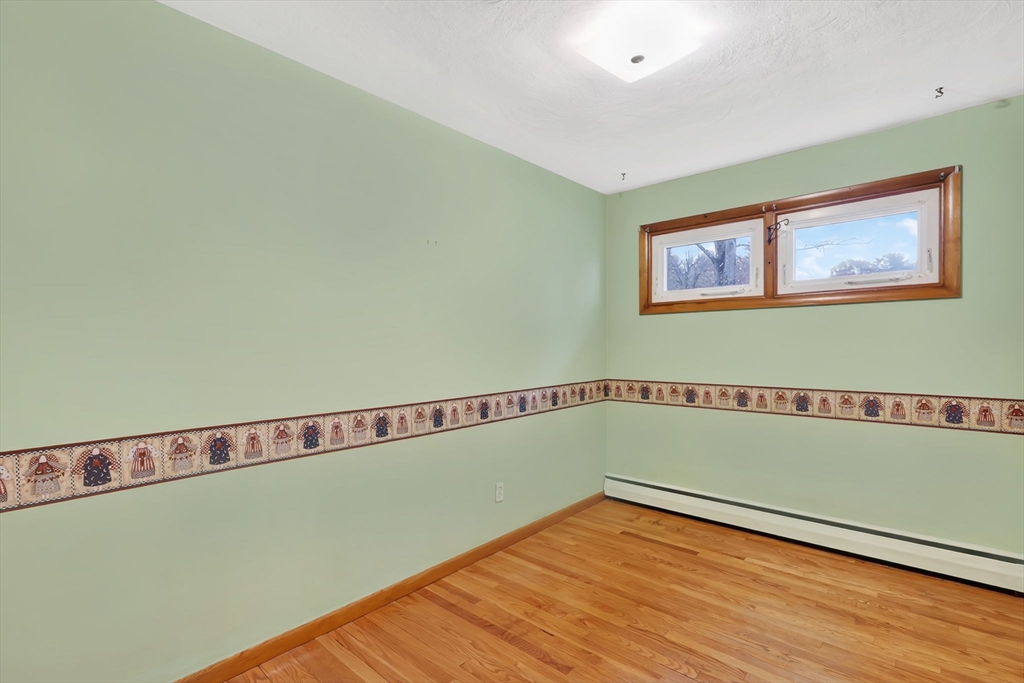193 Marmon Street Springfield, MA 01129 - Photo 15 of 26 a view of a room with wooden floor