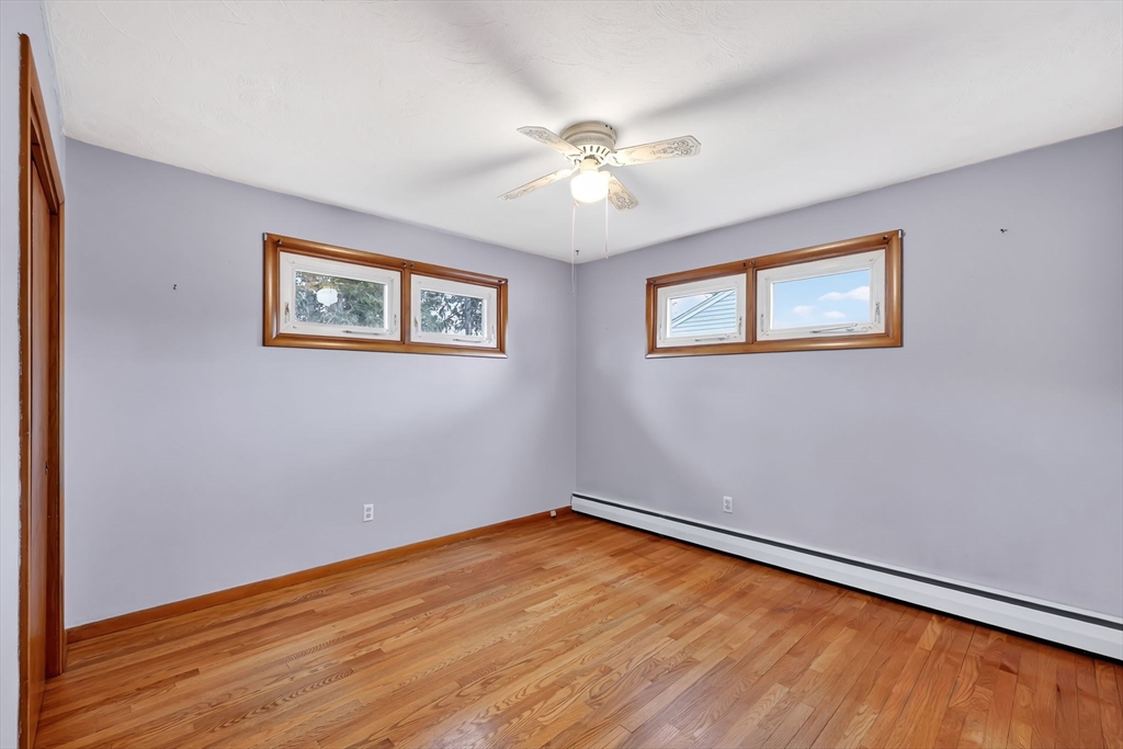 193 Marmon Street Springfield, MA 01129 - Photo 18 of 26 a view of empty room with wooden floor