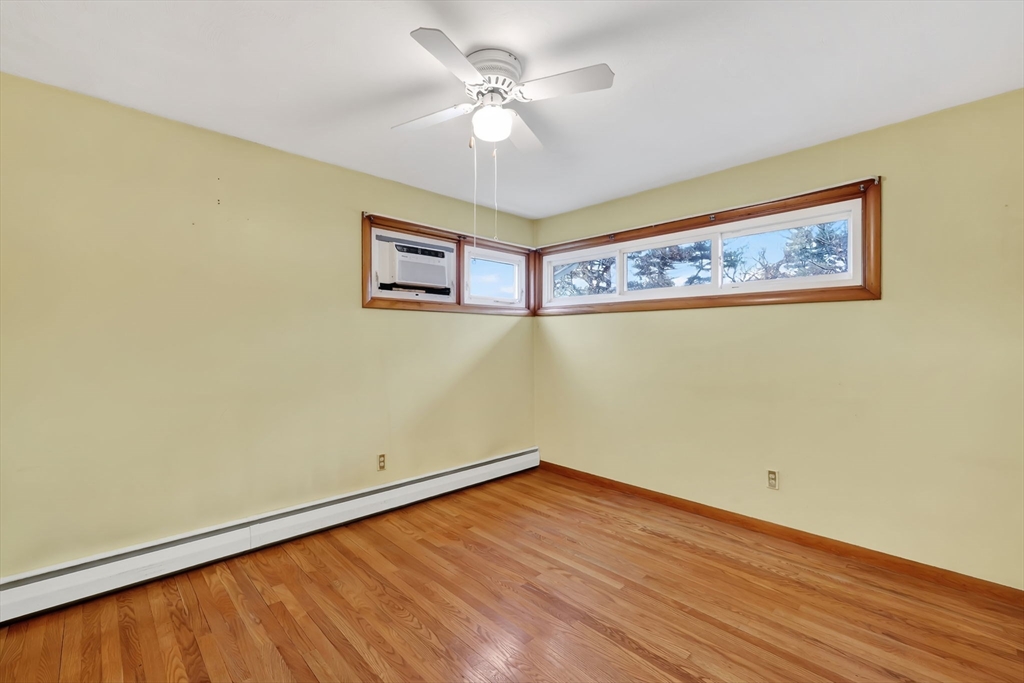 193 Marmon Street Springfield, MA 01129 - Photo 20 of 26 a view of a room with a wooden floor