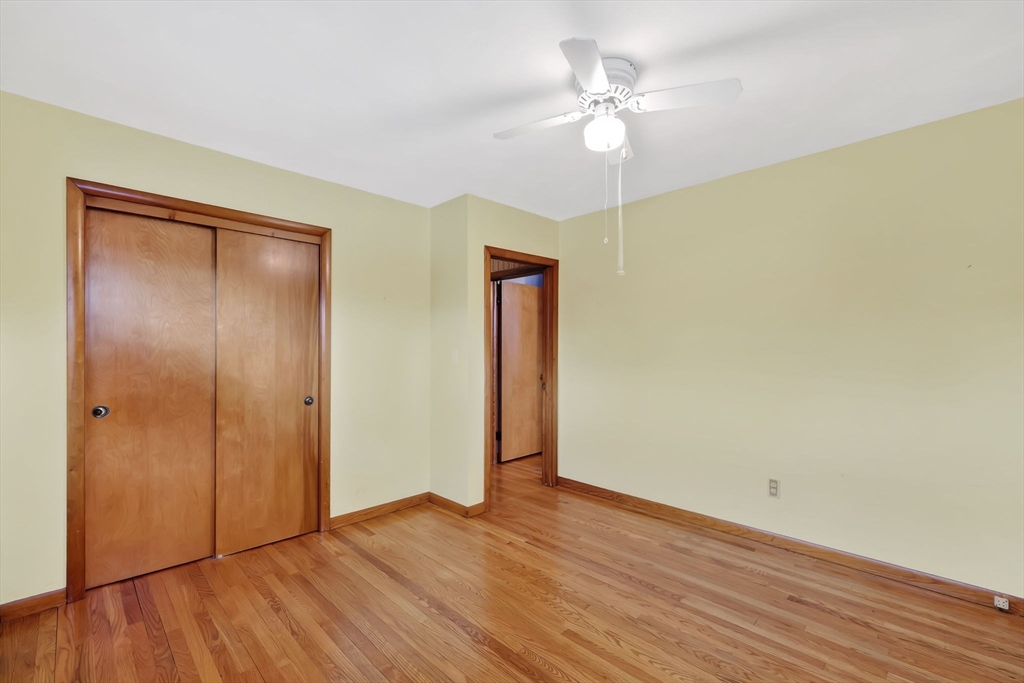 193 Marmon Street Springfield, MA 01129 - Photo 21 of 26 a view of an empty room with wooden floor